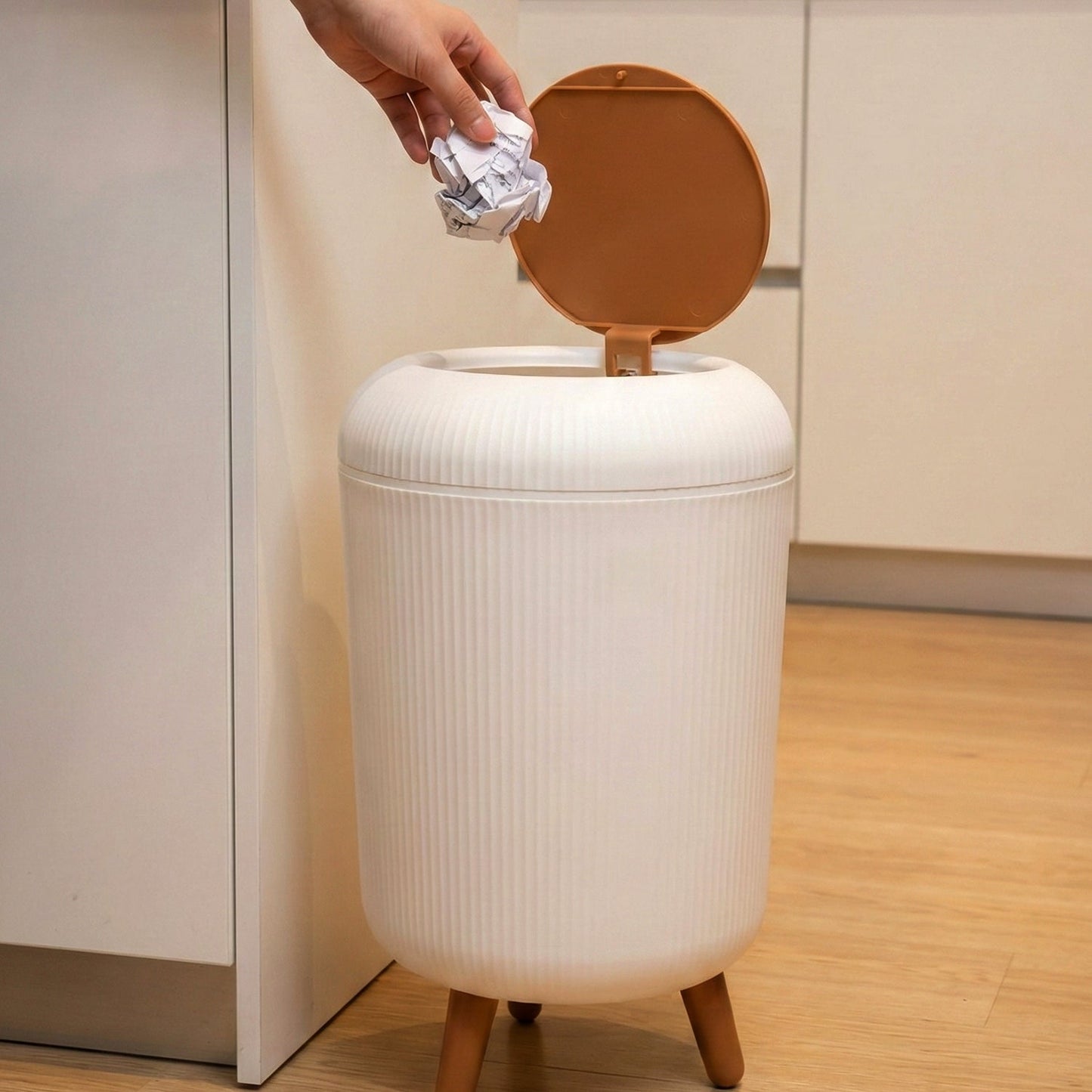 Compact plastic waste bin for home