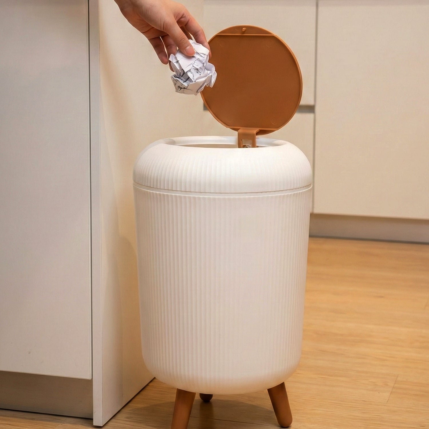 Compact plastic waste bin for home