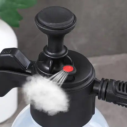 Durable plastic hand pump sprayer 2 litres for watering plants and spraying solutions