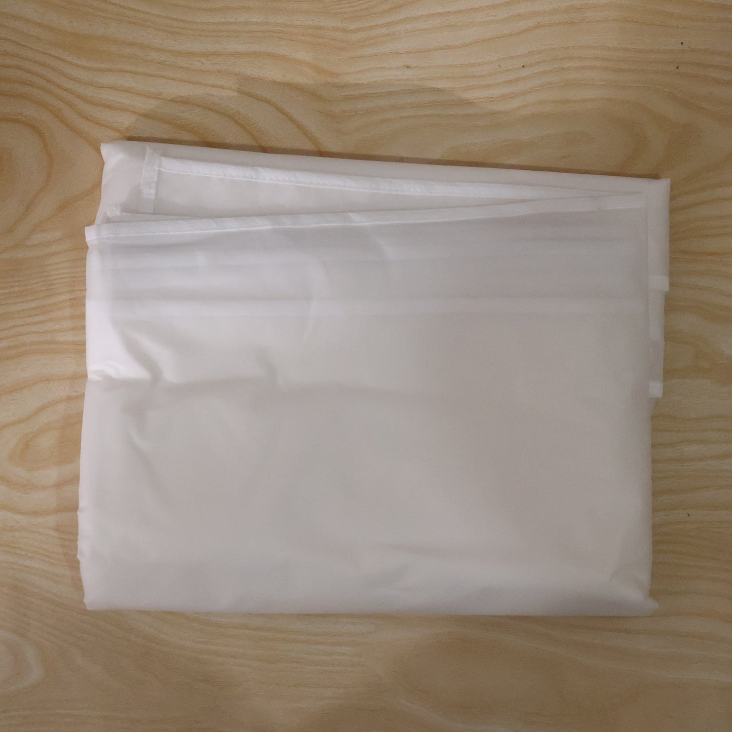 Foldable Non Woven Suit Cover - Folded Compact View