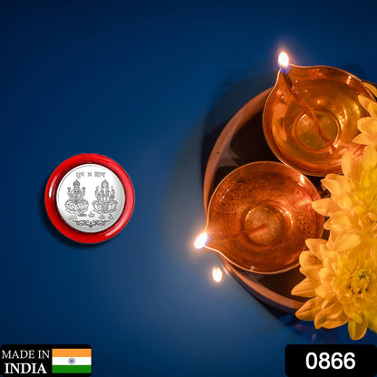 Pooja Coin displayed on decorative surface