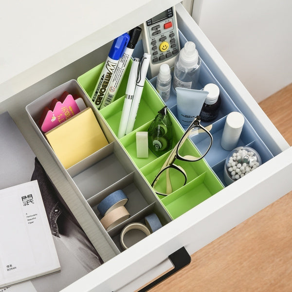 Clear plastic storage tray with dividers for organizing small craft items India