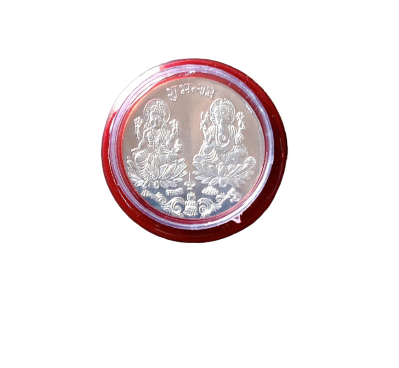 Pooja Coin with packaging displayed on cloth