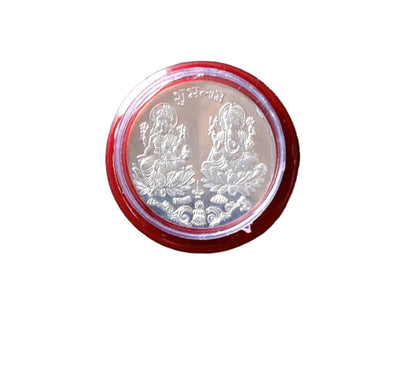 Pooja Coin with packaging displayed on cloth