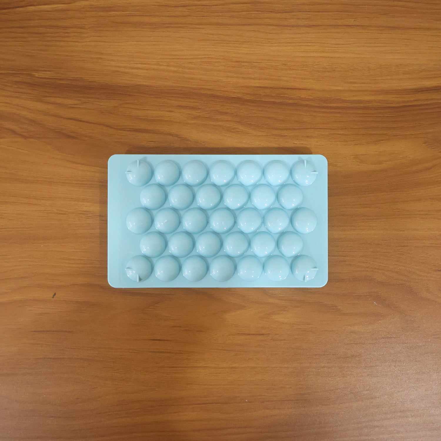 blue plastic candy shaper