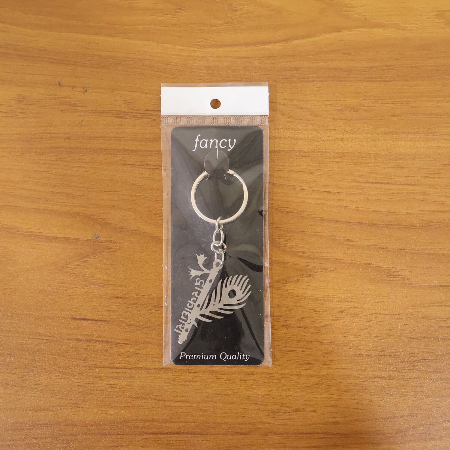 spiritual krishna feather keychain