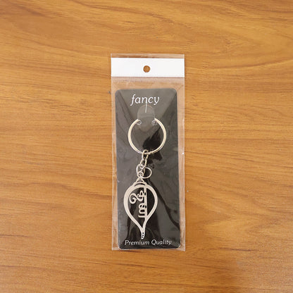 metal krishna symbol keychain