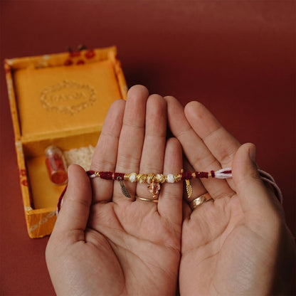Decorative Thread Rakhi Bracelet with Ganesh & Feather Charms (1 Pc)