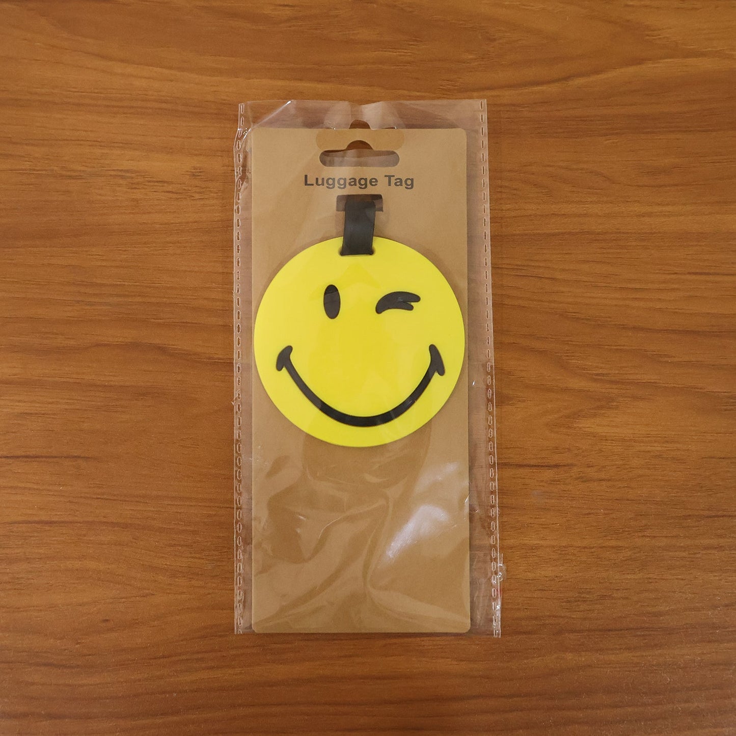 smiley luggage tag