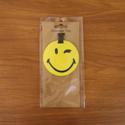 smiley luggage tag