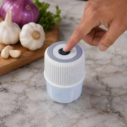 Pressing One-Touch Button on Garlic Chopper