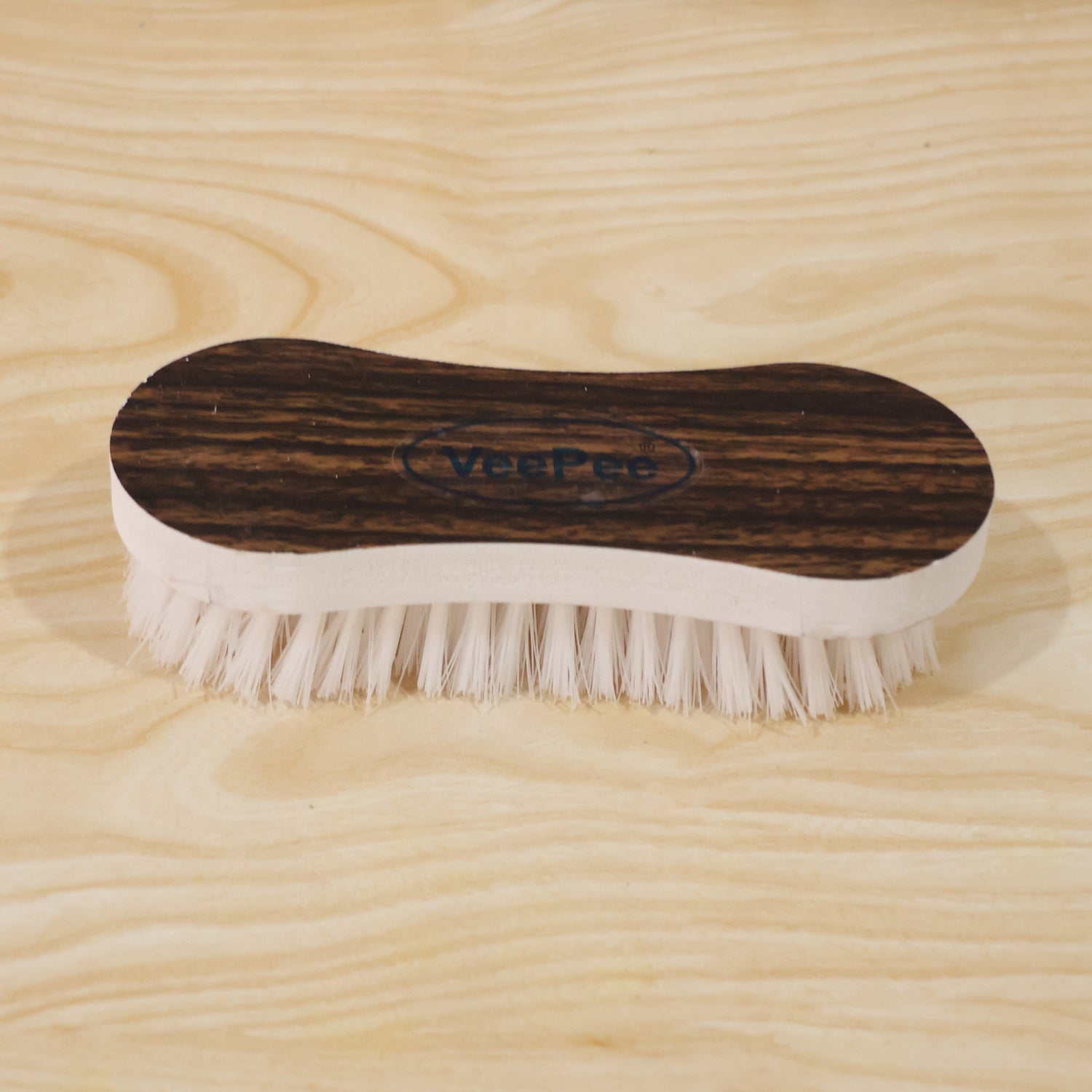 Curved Laundry Brush Wooden Background