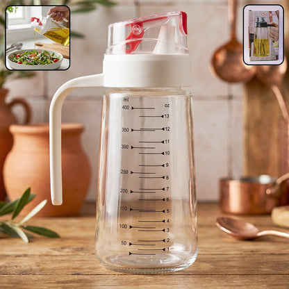 Glass Oil Dispenser Bottle 500ml on Kitchen Counter with Usage Inset Showing Oil Pouring and Side Handle Grip Close-up
