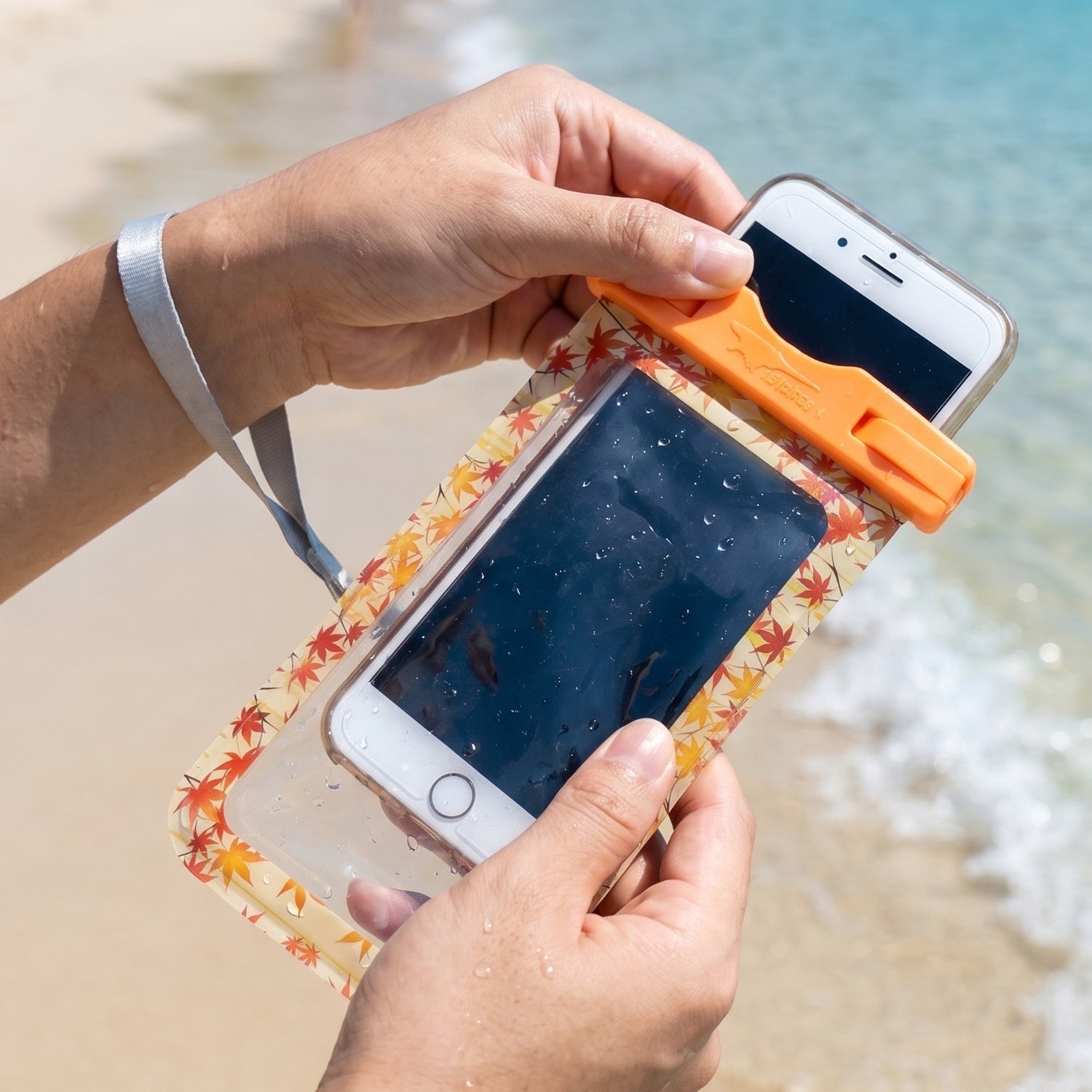 Maple leaf waterproof pouch with lanyard detail